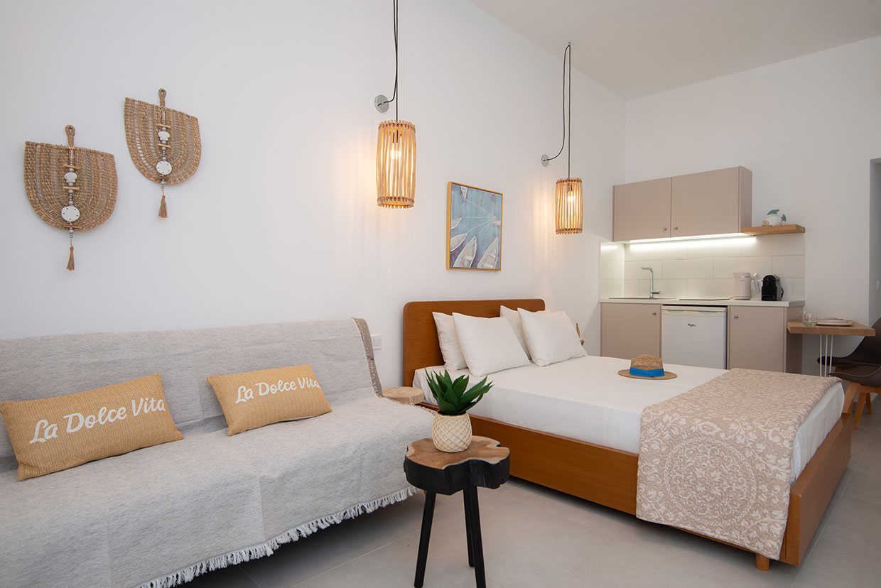 Chambre double avec lit double et canapé-lit
